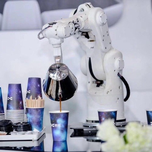 Robot-arm for a restaurant, spilling coffee, tea.